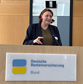 Person während eines Vortrags